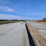 09 października  km 598+200 układanie podbudowy zasadniczej  C8_10 widok w kierunku odcinka VII