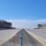 10 marca km 606+150 nawierzchnia betonowa C35_45 powierzchniowe utrwalenie pasa rozdziału montaż barier linowych