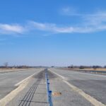 10 marca km 610+700’ warstwa ścieralna SMA11 budowa poboczy i pasa rozdziału widok w kierunku odcinka IX